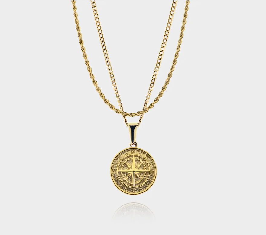 Ciondolo d' oro con Bussola