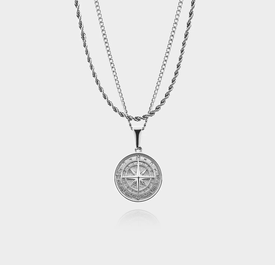 Ciondolo d' oro con Bussola